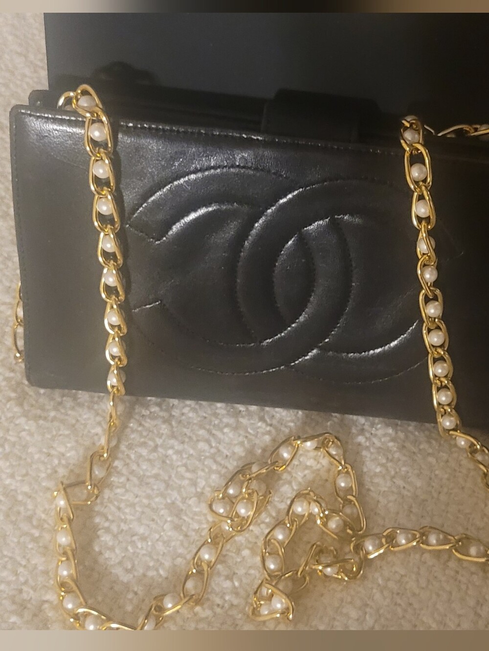 CHANEL Black Quilted Leather Wallet with Unbranded Pearl-Embellished Chain